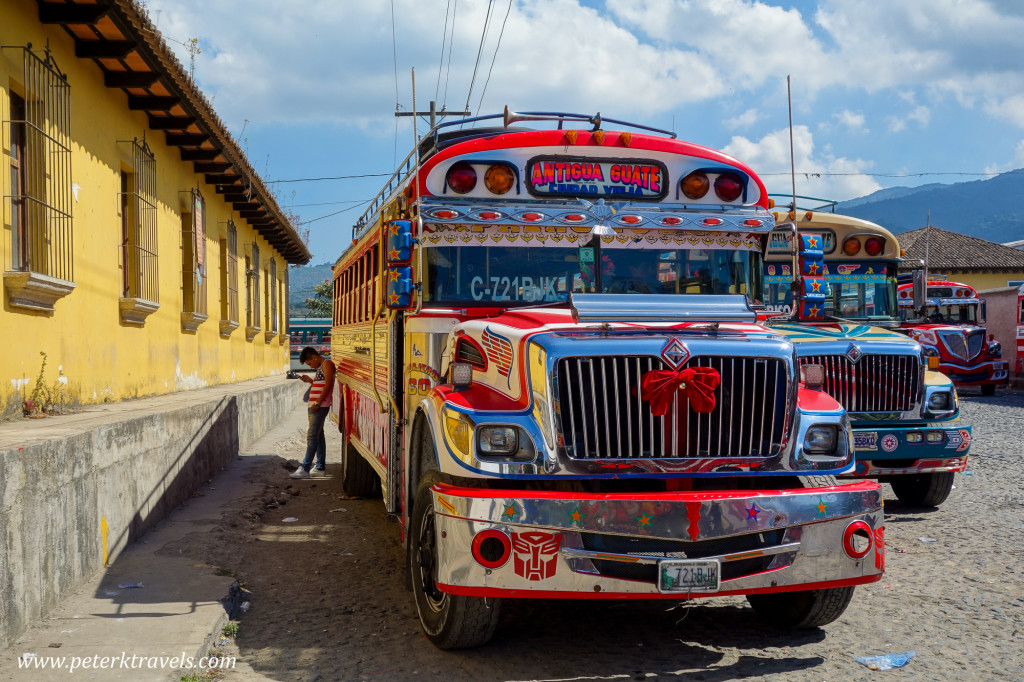 Texting from the shadow of a chicken bus, Antigua Guatemala.